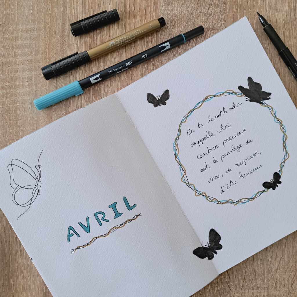 page avril bullet journal - citation et papillons